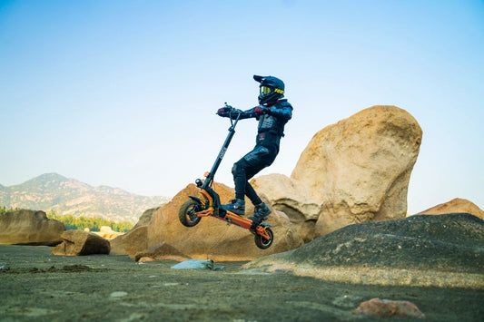 electric scooter riding over cobblestone streets