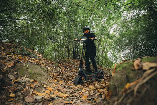 Buy E-Scooter electric scooter rider exploring an outdoor road