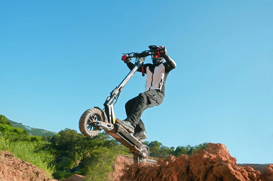 Buy E-Scooter off-road electric scooter rider on a gravel trail